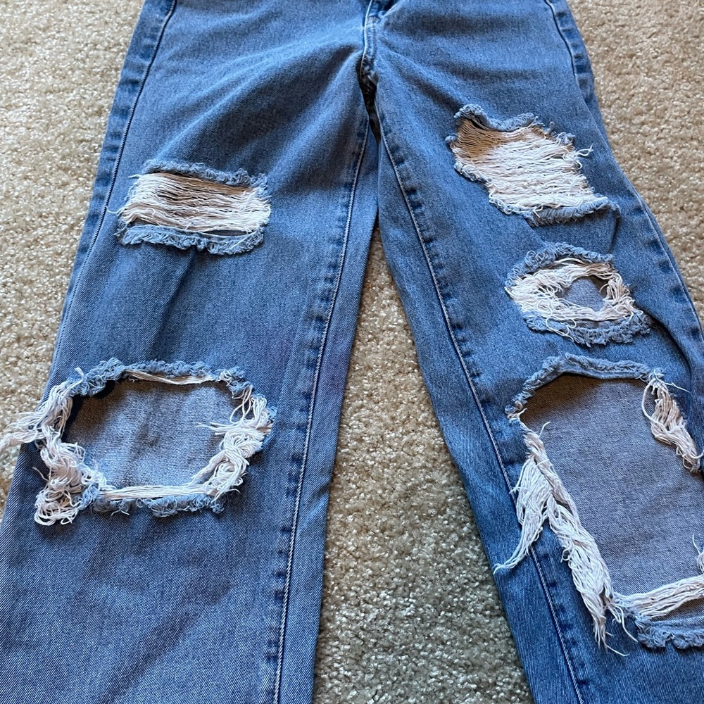 Woman’s baggy jeans